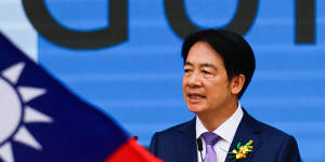 Taiwanese President William Lai speaks outside the presidential palace in Taipei.