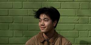 Norman Huang,a final-year student in commerce and computer science,welcomed the 20 per cent cut to student loans that passed parliament.