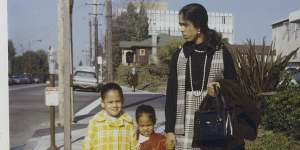 Kamala Harris in 1970 with sister Maya (centre) and mum Shyamala,who separated from her father,Donald,when Harris was five.
