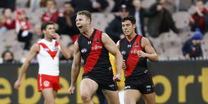 Jake Stringer celebrates one of his two goals in the Bombers’ clash against Sydney.