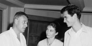Stanley Kramer (left),Donna Anderson and Anthony Perkins on set.