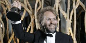 Florian Zeller with his Oscar for best adapted screenplay.