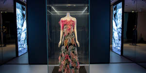 A printed 1939 evening dress with pink ostrich feathers,on loan from Sydney’s Museum of Applied Arts and Sciences.