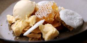 The honeycomb dessert is a cheffy assembly of honey and malt elements.