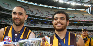 Premiership teammates Shaun Burgoyne and Cyril Rioli.