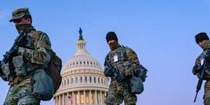 National Guard troops and the US Capitol Police keep watch on the Capitol in March 2021 amid heightened security.