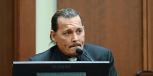 Actor Johnny Depp testifies during a hearing at the Fairfax County Circuit Court in Fairfax,Virginia.
