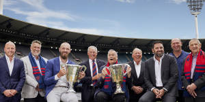Melbourne greats (left to right) Nathan Jones,Todd Viney,current captain Max Gawn,Stan Alves,Ron Barassi,Greg Wells,Garry Lyon,David Neitz and Hassa Mann.