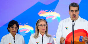 Venezuelan President Nicolas Maduro with first lady Cilia Flores,centre,and Vice President Delcy Rodrigues.