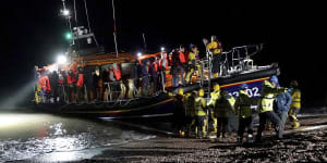 A group of people thought to be migrants are brought in to Dungeness,in Kent,England,late last month.