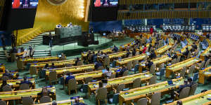 Chinese President Xi Jinping is seen on a video screen at the UN in September. 
