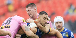 Ryan Matterson is tackled in the trial clash with the Panthers.