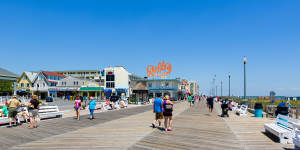 Rehoboth Beach Boardwalk is lined with restaurants and amusement arcades.
