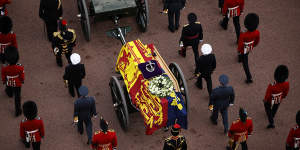 Queen Elizabeth II’s flag-draped coffin on The Mall.