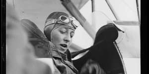 English aviatrix Amy Johnson in the cockpit of her plane,in Sydney shortly after the completion of her epic England-Australia solo flight,1930
