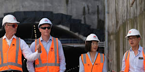 From left:Transport Minister John Graham,NSW Premier Chris Minns,Deputy Premier Prue Carr and Strathfield MP Jason Yat-Sen Li at the excavation and construction site of Burwood North Metro Station in April.