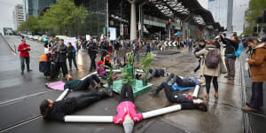 In October 2019,Extinction Rebellion protesters locked themselves together using plastic pipes to block the junction of Spencer and Collins streets.