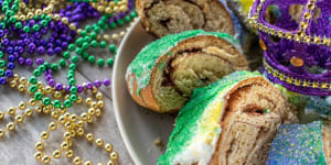 Associated with epiphany in many countries,a King Cake features purple icing for justice,green for faith and gold for power.