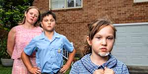 Debbie Levien,and her children Oliver and Emilia,who will be able to attend only Killara High because of their sister’s enrolment.