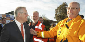 Former prime mnister Scott Morrison with the late senator Jim Molan during a visit to meet NSW SES and NSW Rural Fire Service volunteers in 2018.