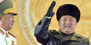 Kim Jong-un vows nuclear might in elaborate ballistic missile parade