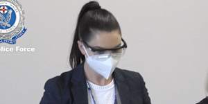 NSW Police arrest Sydney teacher Helga Lam on Friday morning.