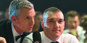 Dustin Martin,seen here with broadcasting great Bruce McAvaney,has largely been a media recluse through his stellar career.