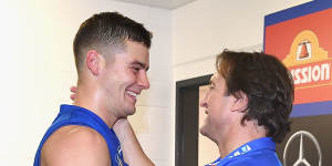 Midfielder Josh Dunkley with Bulldogs coach Luke Beveridge.