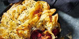 Tomatoes and peppers add a ray of sunshine to this cosy chicken pie.