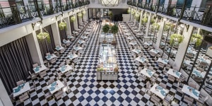 The grand interior of the Anantara Grand Hotel Krasnapolsky Amsterdam.