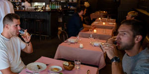Pink tablecloths adorn the Potts Point venue.