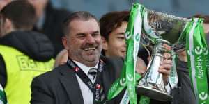 GLASGOW,SCOTLAND - FEBRUARY 26:Celtic manager Ange Postecoglou lifts the Viaplay Cup with teammates trophy following victory in the Viaplay Cup Final between Rangers and Celtic at Hampden Park on February 26,2023 in Glasgow,Scotland. (Photo by Ian MacNicol/Getty Images)