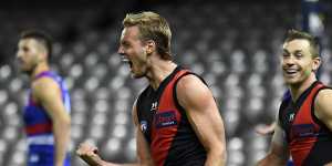 Darcy Parish relishes the moment after scoring.