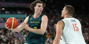 Hurt locker:Josh Giddey takes on fellow NBA star Nikola Jokic in the Australia-Serbia quarter-final at the Paris Olympics.