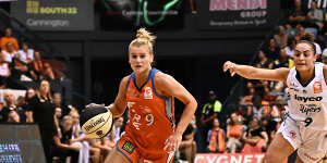 Shyla Heal of the Fire drives up court during game one of the WNBL Grand Final Series between Townsville Fire and Southside Flyers at Townsville Entertainment Centre,on March 18,2023.