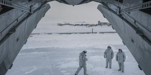 Russian soldiers near a cargo plane at the Trefoil Base on Franz Josef Land,Russia’s northernmost military outpost.