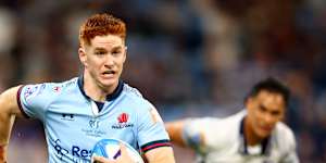 Sid Harvey on the charge against the Blues.