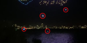 Some of the estimated 50 drones falling from the sky during the drone show. 