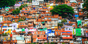 From a distance,Rio’s colourful favelas look appealing.