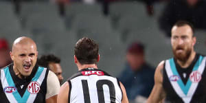 As it happened:Fast-finishing Power overrun Dogs in the wet,unfancied Bombers stun Dees in huge uspet,Lions demolish North