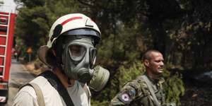 A firefighter works to contain a wildfire near Athens during a heatwave in Greece. Meanwhile,Sicily may have set a modern record for the hottest day ever in Europe on Friday,with a recorded temperature of 48.8 degrees.