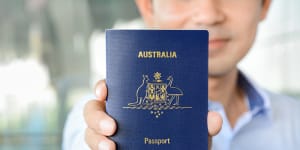 A man showing passport (of Australia) iStock image for Traveller. Re-use permitted. Passport generic