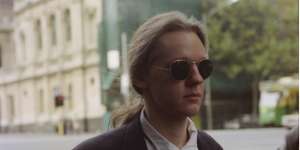 Young hacker:Julian Assange outside court in 1995 after being accused of hacking into global computer systems.