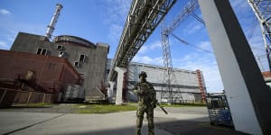 A Russian serviceman guards an area of the Zaporizhzhia Nuclear Power Station.