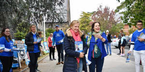 Katie Allen and Kelly O'Dwyer campaign on a pre-poll booth in Higgins on Saturday.