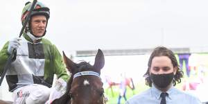 Brett Prebble returns to the mounting yard after the win by Incentivise. 