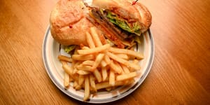 Steak sandwich with chutney and cheese (and chips).