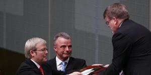 Kevin Rudd and Brendan Nelson hand over the official apology after it was delivered.