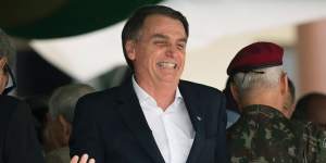 Brazil's President-elect Jair Bolsonaro smiles during a ceremony marking the 73rd anniversary of the Brazilian Paratrooper Infantry Brigade in Rio de Janeiro last month.