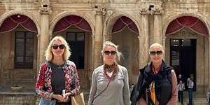 The writer (left) with two of her sisters in the baroque town of Noto in south-east Sicily.
